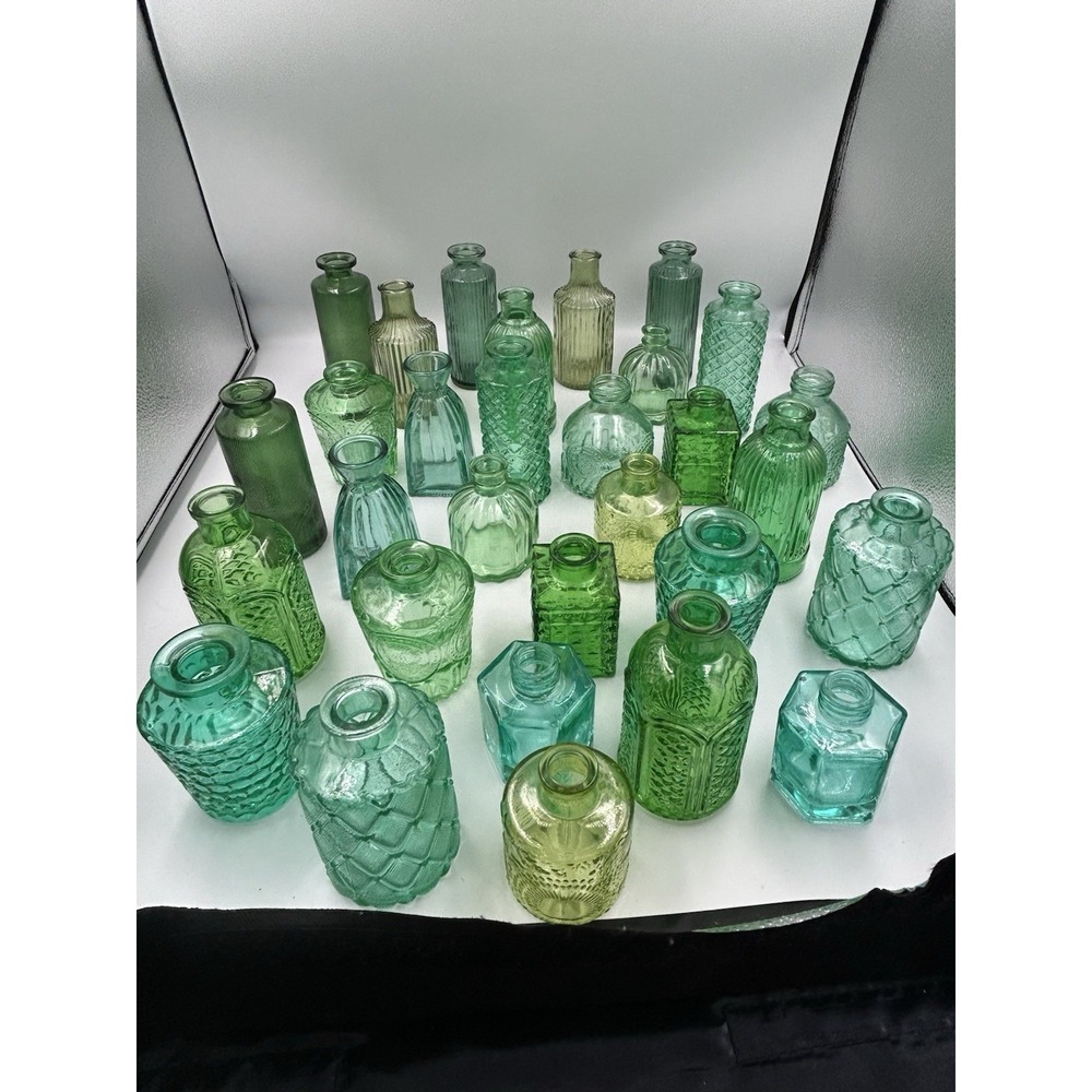 Glass Bud Vase Miniature Bottles. Various sizes consists of 25 pieces never used